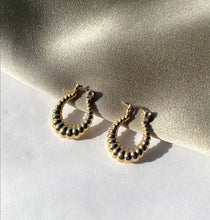 Load image into Gallery viewer, 14k Yellow Gold Oval Shiny Polished Graduated Twisted Hoop Earrings Real 14K Yellow Gold
